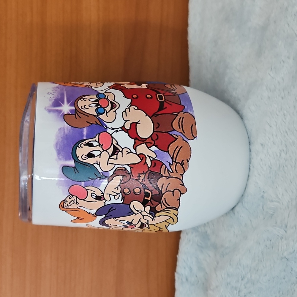 The seven Dwarf insulated wine or coffee tumblr, stainless steel twelve ounce.ne